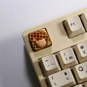 Showcasing the adorable handcrafted bear waffle artisan keycap, a charming 3D dessert in rich chocolate brown, perfect for custom keyboards.