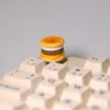 Handmade Mini Cod Fish Burger Keycap featuring a hyper-realistic miniature cheese cod burger with intricate textures and vibrant colors, showcasing unique craftsmanship.