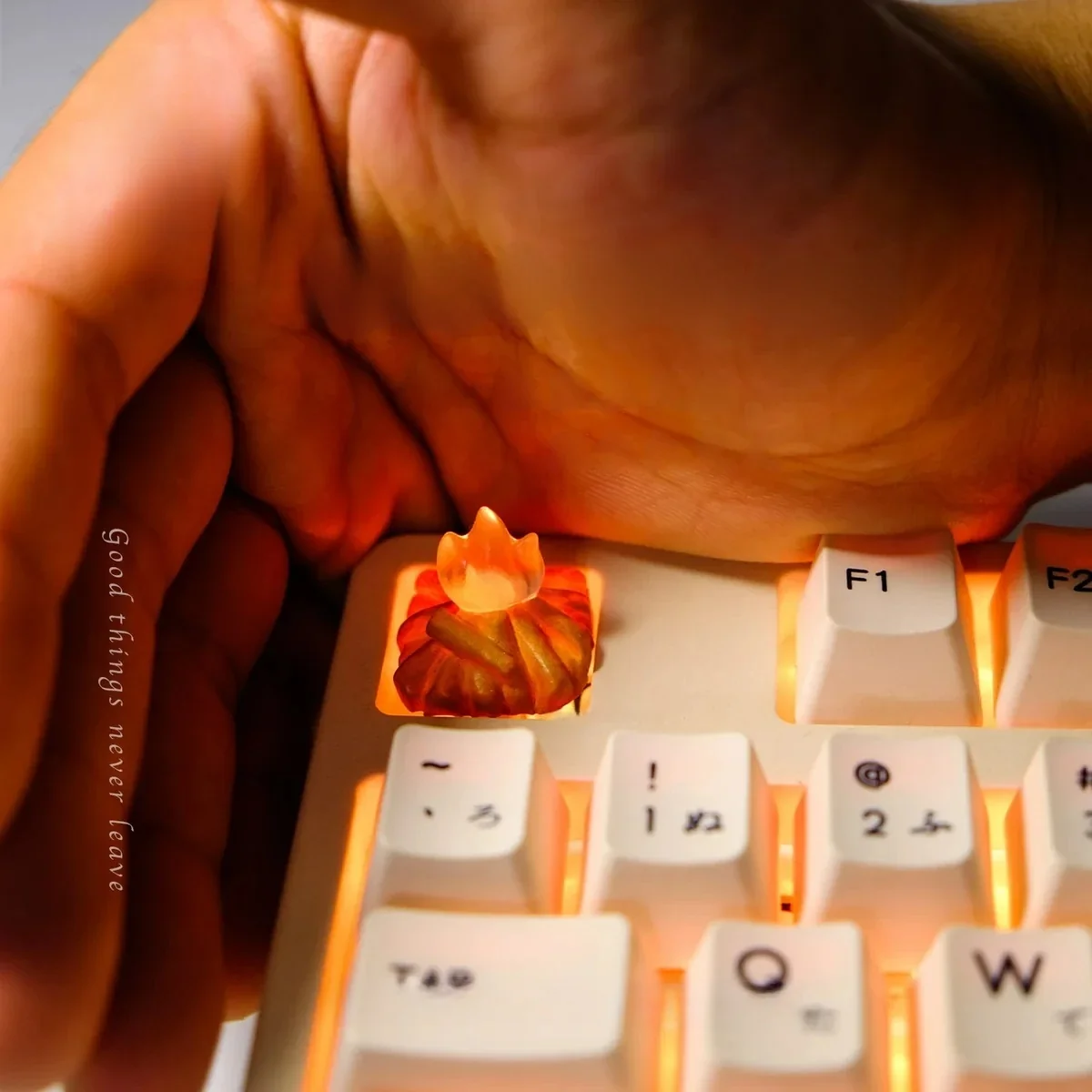 Experience the artistry of this handmade Glowing Bonfire 3D Artisan Keycap, intricately sculpted from translucent resin, emitting a warm, mesmerizing setup.
