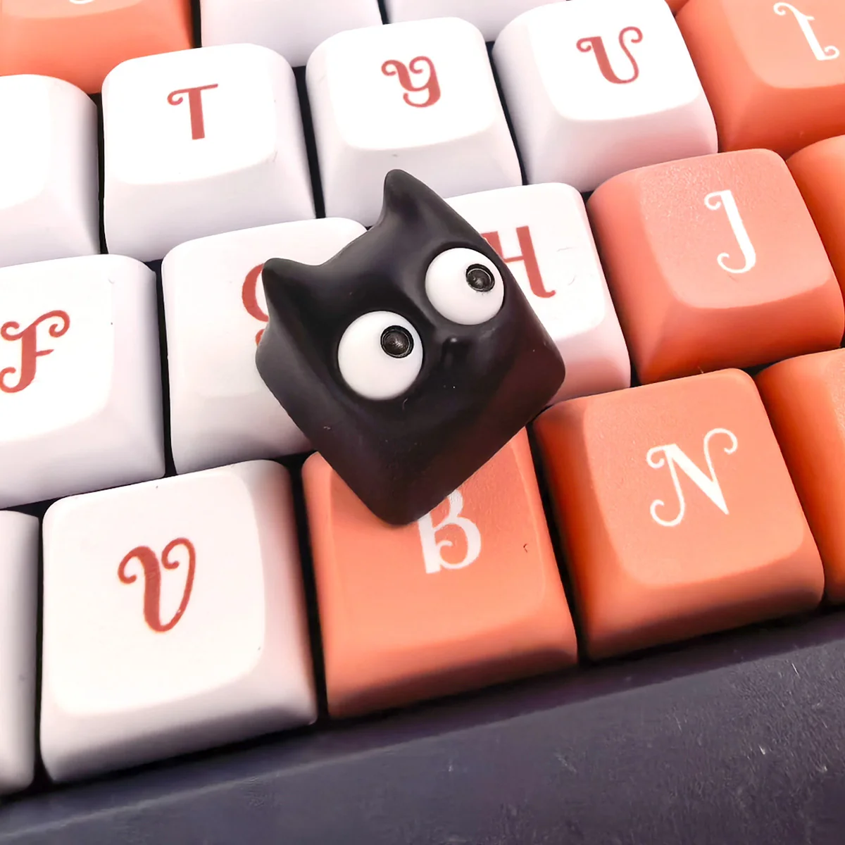 Whimsical Little Black Cat artisan resin ESC keycap from various angles, highlighting its translucent material, intricate handmade details, and unique charm.