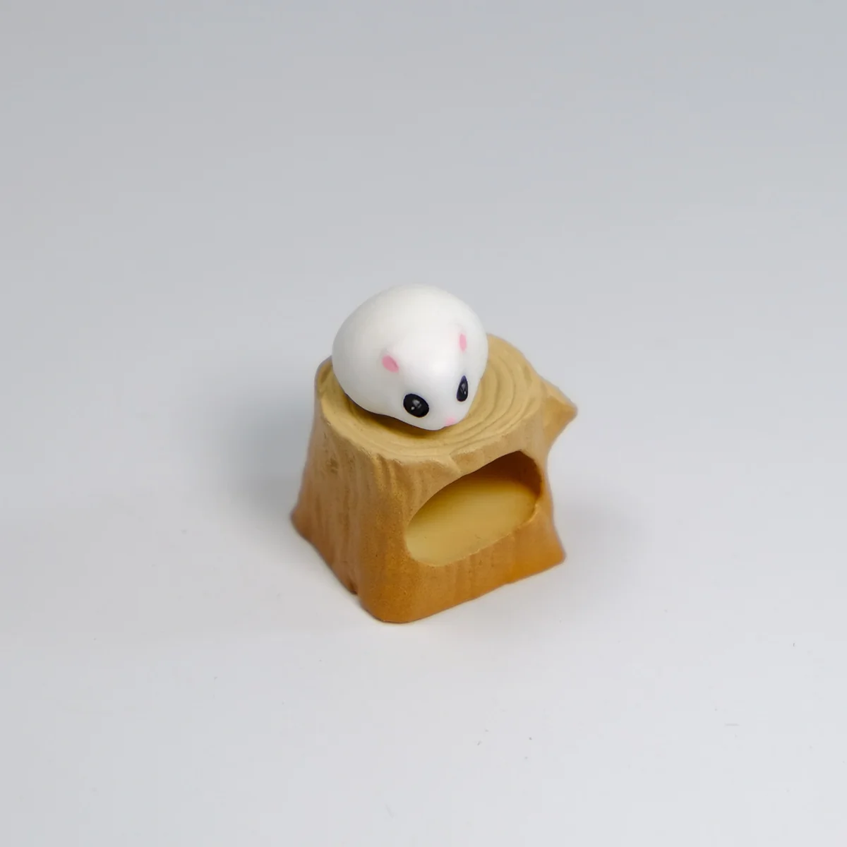 Handmade magnetic hamster stump artisan keycap shown from various angles, emphasizing the detachable hamster and intricate woodland base.