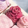 Exquisite handcrafted rose artisan keycaps, multiple angles revealing delicate resin roses in clear and tinted resin, a romantic garden for your keyboard.