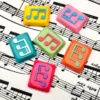 Artistic close-up views of a handcrafted Musical Note Low Shaft Keycaps with a fluid music note, emphasizing its unique design and quality.