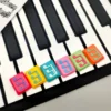 A collection of Musical Note Low Shaft Keycaps, each handcrafted with fluid music notes, showcasing their artistic detail from multiple angles.
