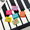 Musical Note Low Shaft Keycaps featuring a fluid music note design, highlighting its handcrafted artistry and unique appeal.