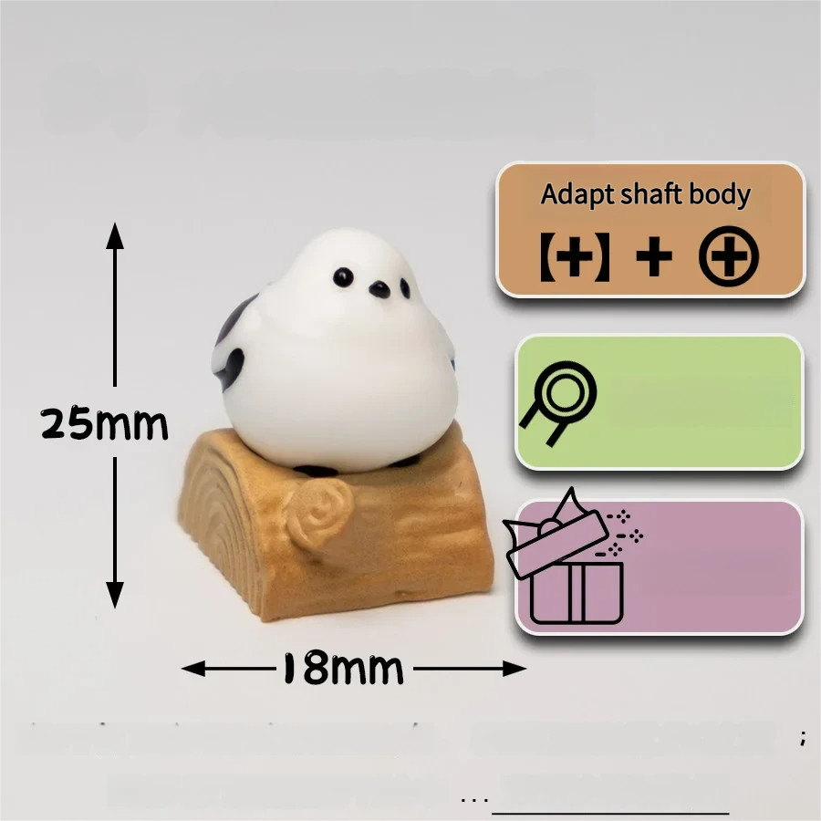 Close-up side view of the whimsical handmade artisan Bushtit keycap, featuring an adorable 3D sculpted bird perched on a rustic log.