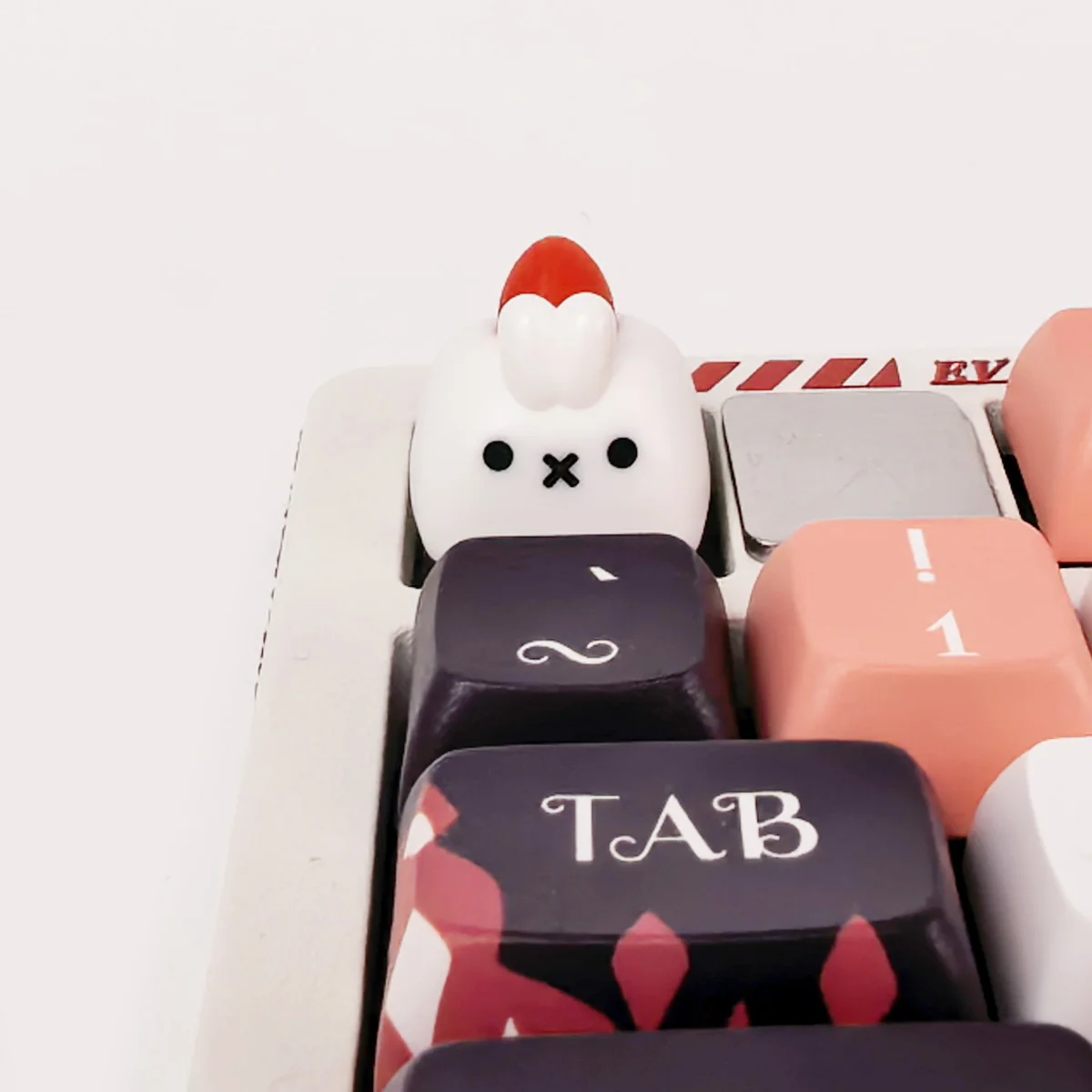 Whimsical handcrafted artisan rabbit ESC keycap gallery showcasing its strawberry design, tactile texture, and intricate details from multiple angles.