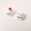 Whimsical artisan rabbit ESC keycap, handcrafted with a charming strawberry design and tactile embossed texture for a delightful desk accent.