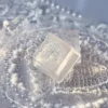 Handcrafted artisan snowflake keycap gallery views, revealing its translucent resin, ethereal glow, and delicate suspended snowflakes like winter's design.