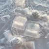 Artisan Snowflake Keycap, handcrafted with translucent resin, featuring an ethereal snowflake suspended in a dreamy, misty glow.