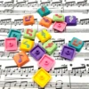 Close-up gallery of Treble Clef Low Shaft Keycaps, showcasing handcrafted resin musical notes with vibrant colors and glossy finish from various angles.
