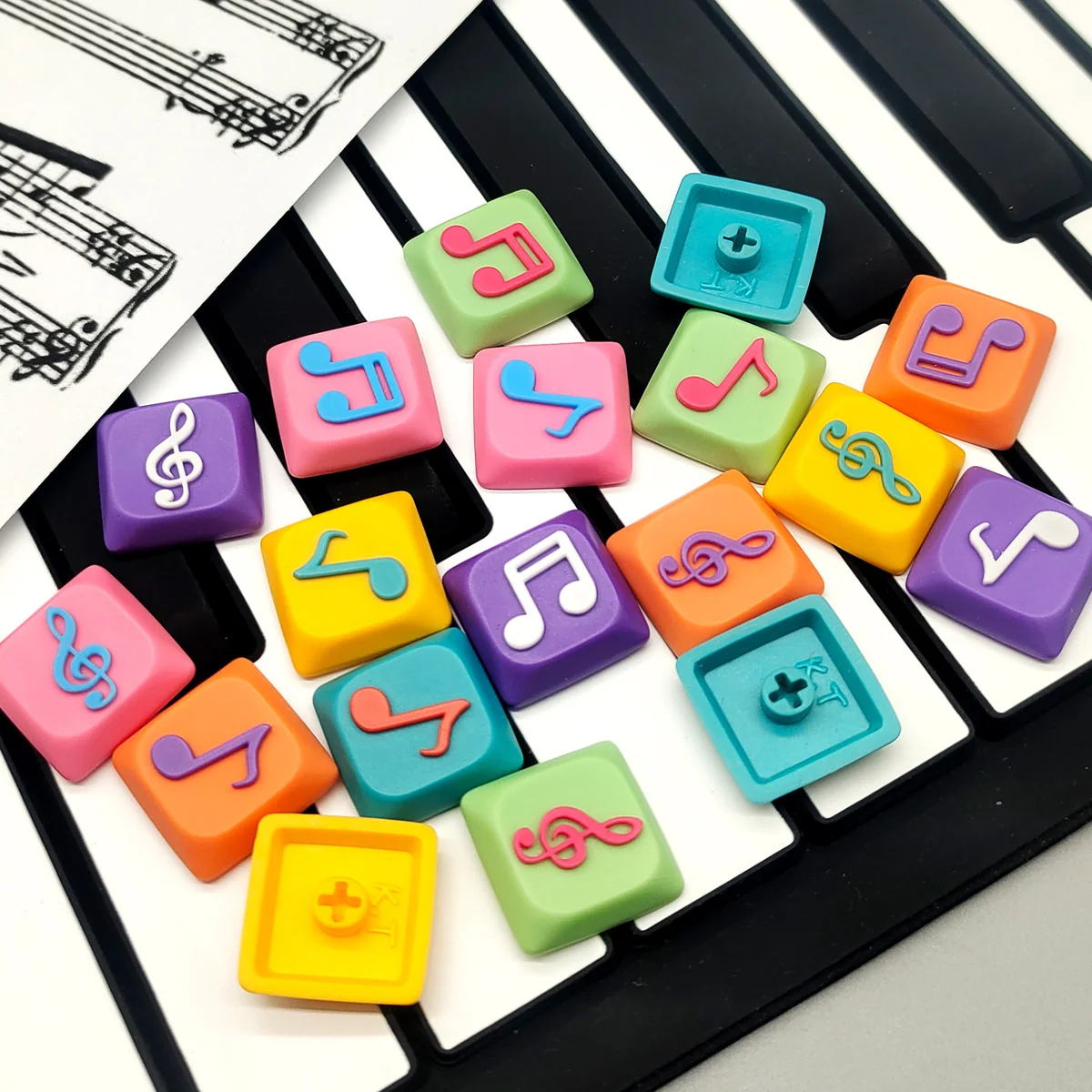 Treble Clef Low Shaft Keycaps gallery: handcrafted resin musical note MX keycaps in vibrant colors, glossy finish, shown from multiple artistic angles.