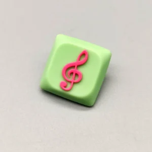 Treble Clef Low Shaft Keycaps featuring a vibrant treble clef on a playful green base, a unique musical note accessory.