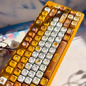 Honey Buzz Bee PBT Keycaps set, showcasing vibrant dye-sub bee, honeycomb, and flower motifs for a joyful keyboard.