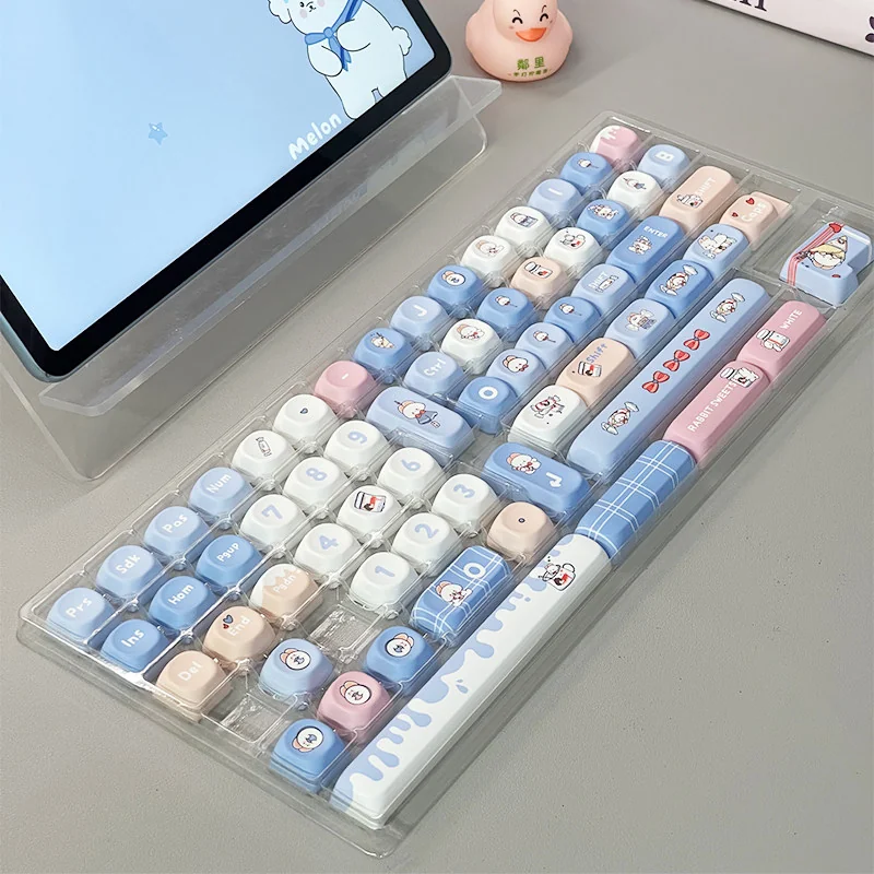 Playful White Rabbit MOA PBT keycaps set showcasing the iconic milky white and red theme from multiple angles, highlighting the comfy spherical profile.