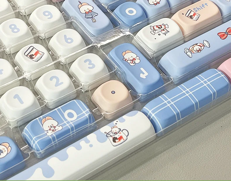 Iconic White Rabbit MOA PBT Keycaps Set exhibit milky white, blue, red spherical profile. Durable PBT and comfy MOA provide nostalgic typing.