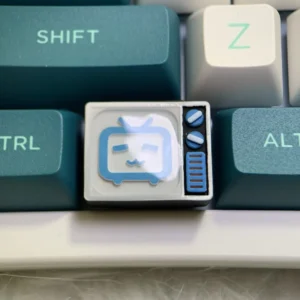 A gallery of the playful BiliBili Pixel TV keycap, showcasing its handcrafted resin art, retro design, and backlit detailing from various angles.
