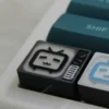 Handcrafted BiliBili Pixel TV keycap views, showing intricate translucent resin art with retro pixel detail and backlit Bilibili logo from various angles.