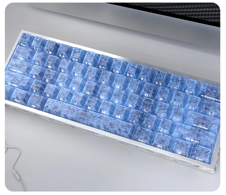 A gallery of exclusive blue forged carbon keycaps set, showcasing their dynamic texture, sleek modern design, and precision side-printed legends from various angles.