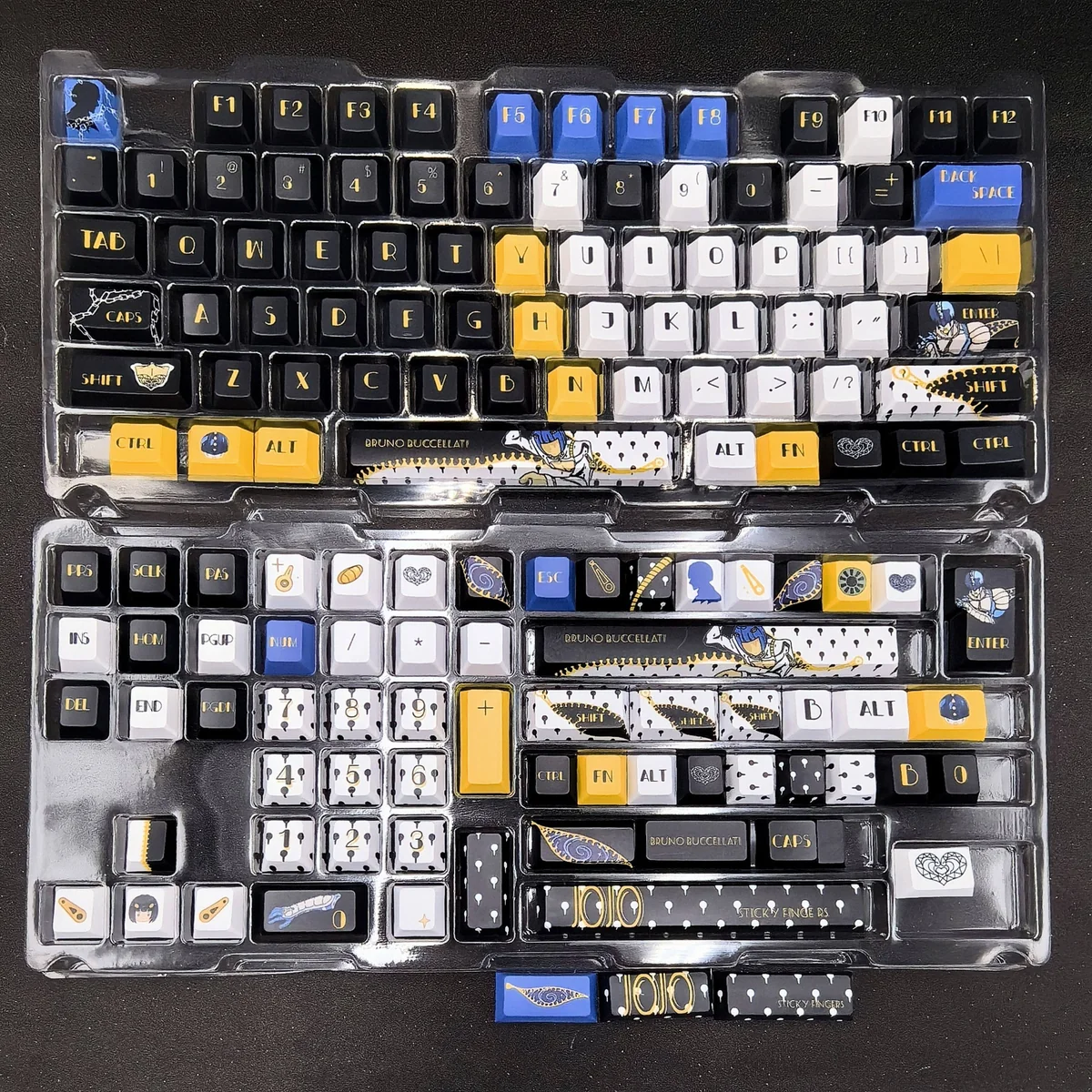 Buccellati Keycap Set displayed from various angles, showcasing the exclusive Golden Wind tribute design, iconic zippers, and distinct color palette.