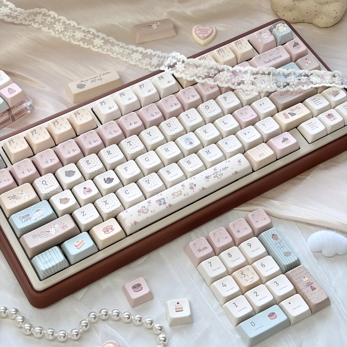 A playful gallery of pastel Bunny Keycaps Set from the Whimsical Dessert Party Set, showcasing different angles of the cute mechanical keycaps.
