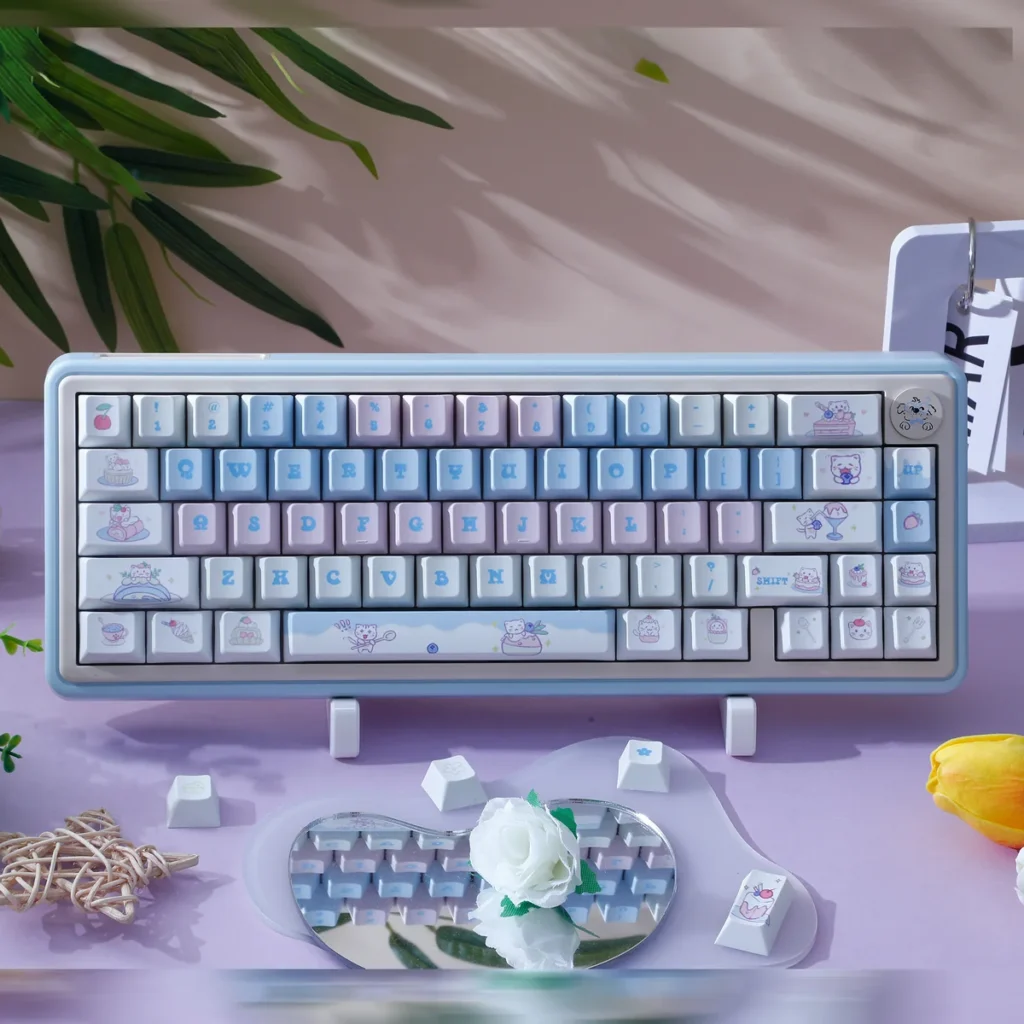 Adorable Cat Cake PBT Dye-Sub Keycap Set, showcasing whimsical pastel cat and cake motifs for a charming and playful keyboard aesthetic.
