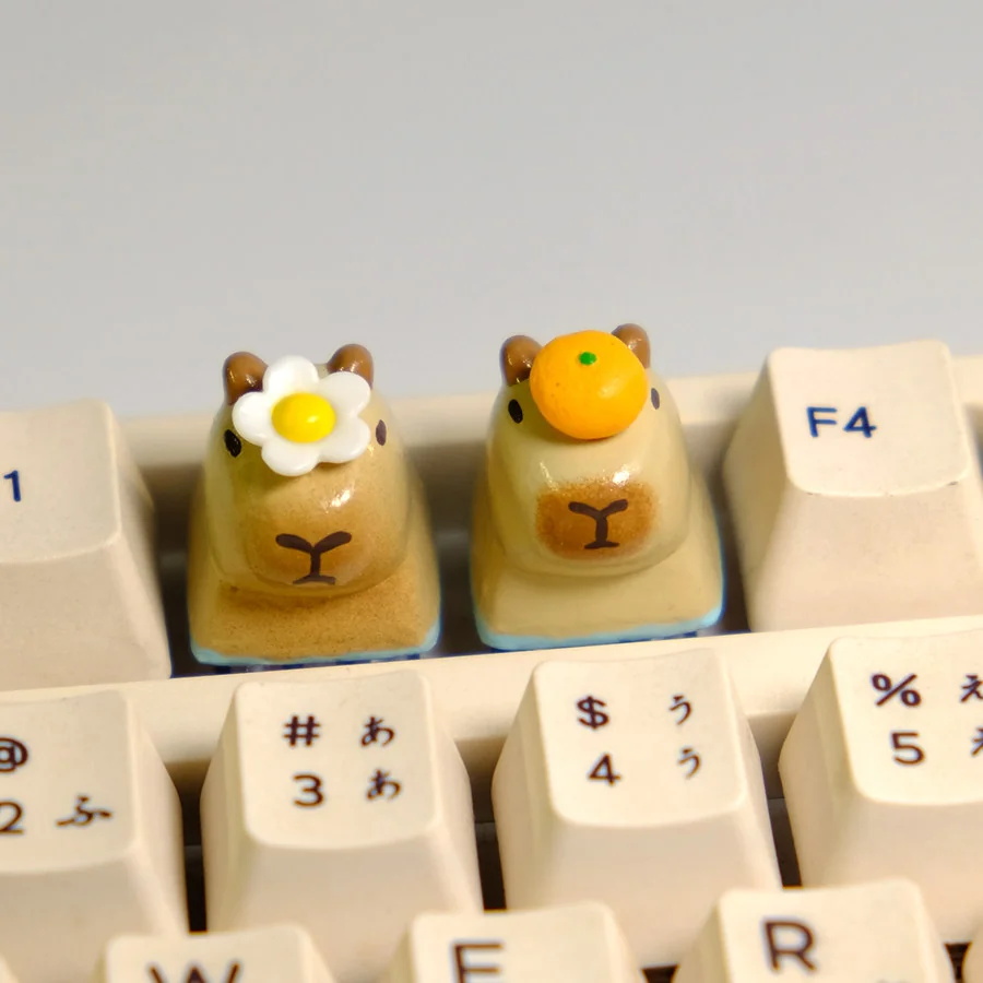 Handmade Capybara With Orange & Flower Keycap with magnetic flora and fruit accessories, shown from multiple angles, highlighting its adorable resin craftsmanship.