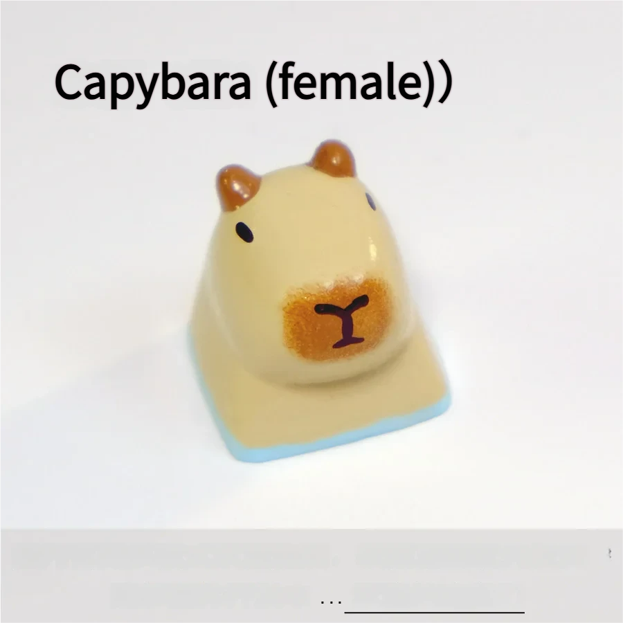 Handmade female Capybara With Orange & Flower keycap in resin, showing a serene expression with charming magnetic flora accessories. Adorable and artistic.