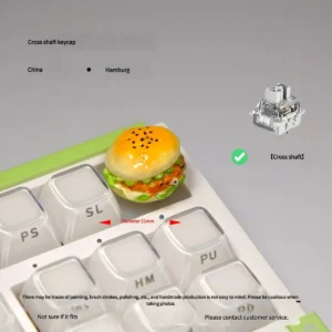 This Whimsical Cheese Burger Keycaps captured from various angles to shown the glowing visual appearance of the burger.