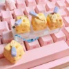 Multiple angles of the adorable handcrafted whimsical cheesecake artisan keycap, featuring its intricate miniature design and a charming playful fork.