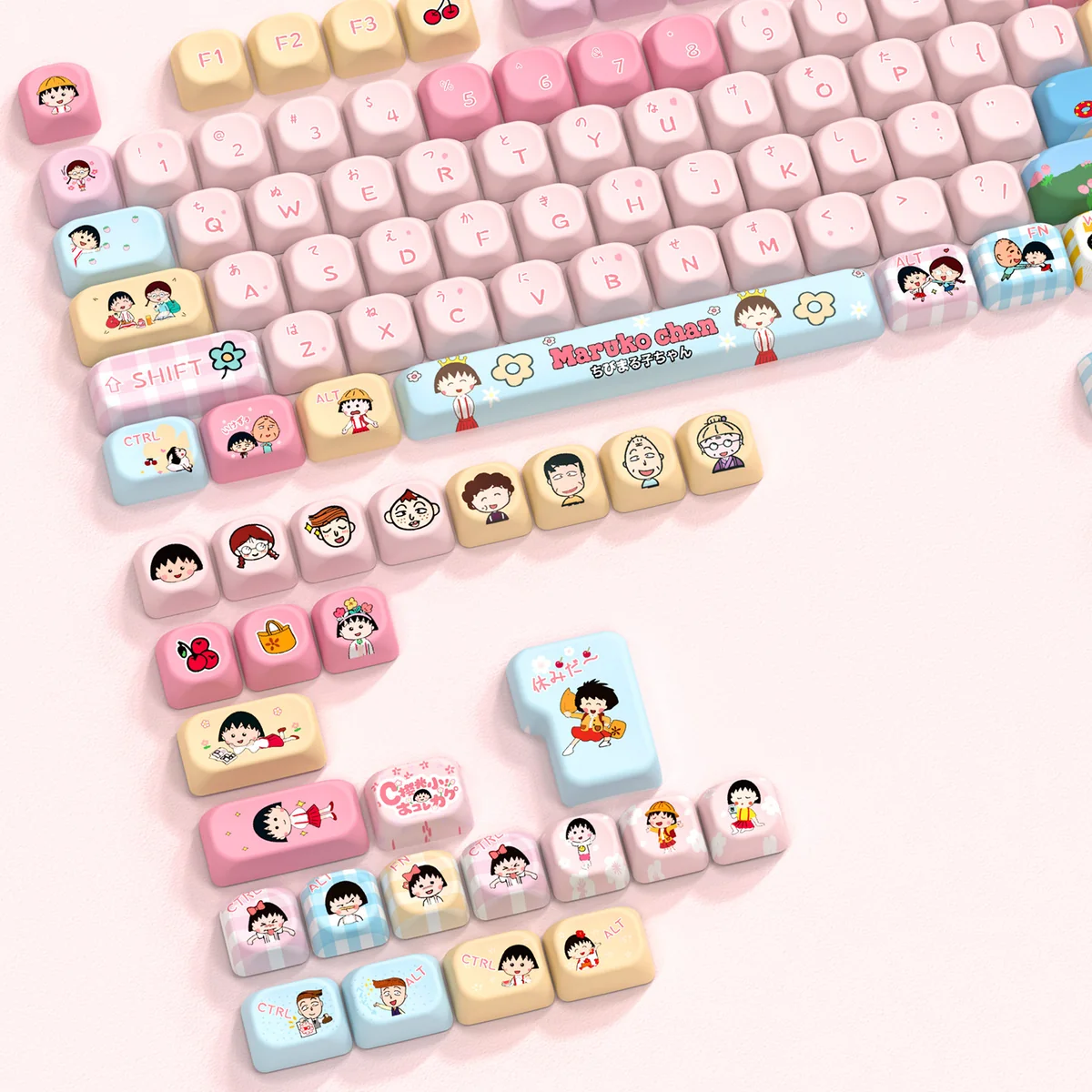 Vibrant Chibi Maruko-chan PBT keycaps set in MOA profile, showcasing nostalgic characters from multiple angles.