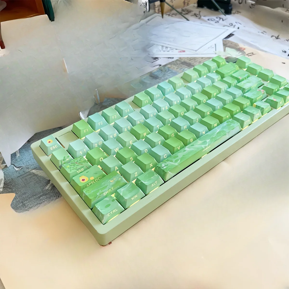 A gallery of poetic Chinese art keycaps set, showcasing exquisite backlit traditional landscapes with green plums and tranquil rain from various angles.