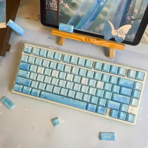 Main image of glowing PBT Tranquil Chinese Landscape Cherry Keycap Set, displaying serene misty mountains and rivers, beautifully backlit.