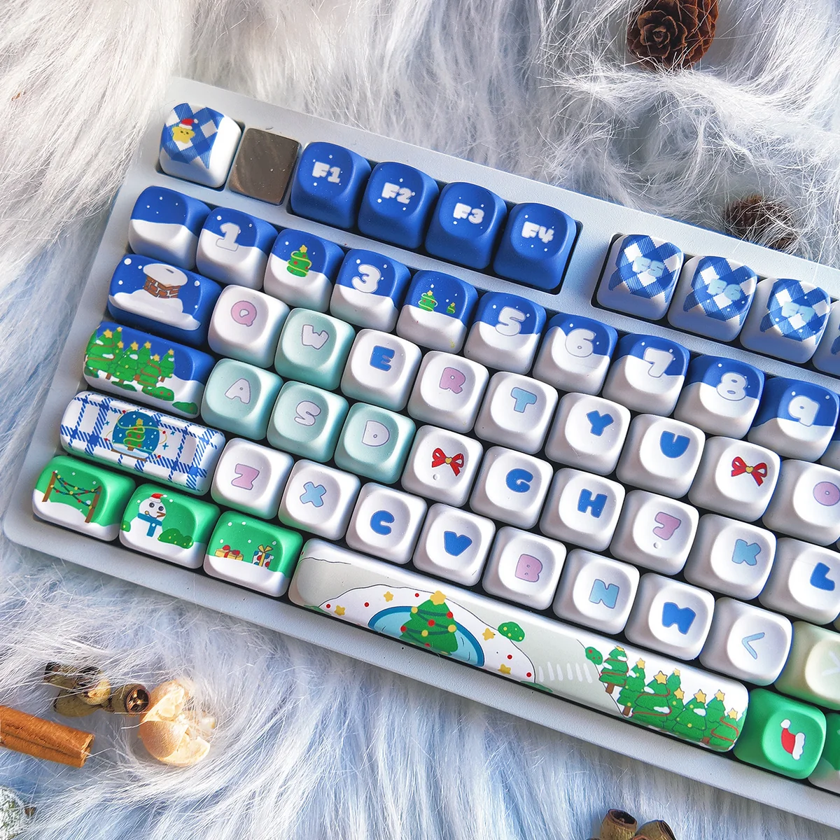 Detailed shot of festive blue PBT Christmas keycaps set, showcasing durable texture and charming white winter wonderland icons from a unique angle.