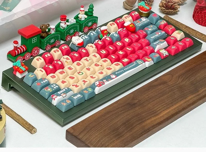 Whimsical Christmas PBT SO Profile keycaps set, displaying vibrant dye-sublimated holiday themes and characters from various angles.