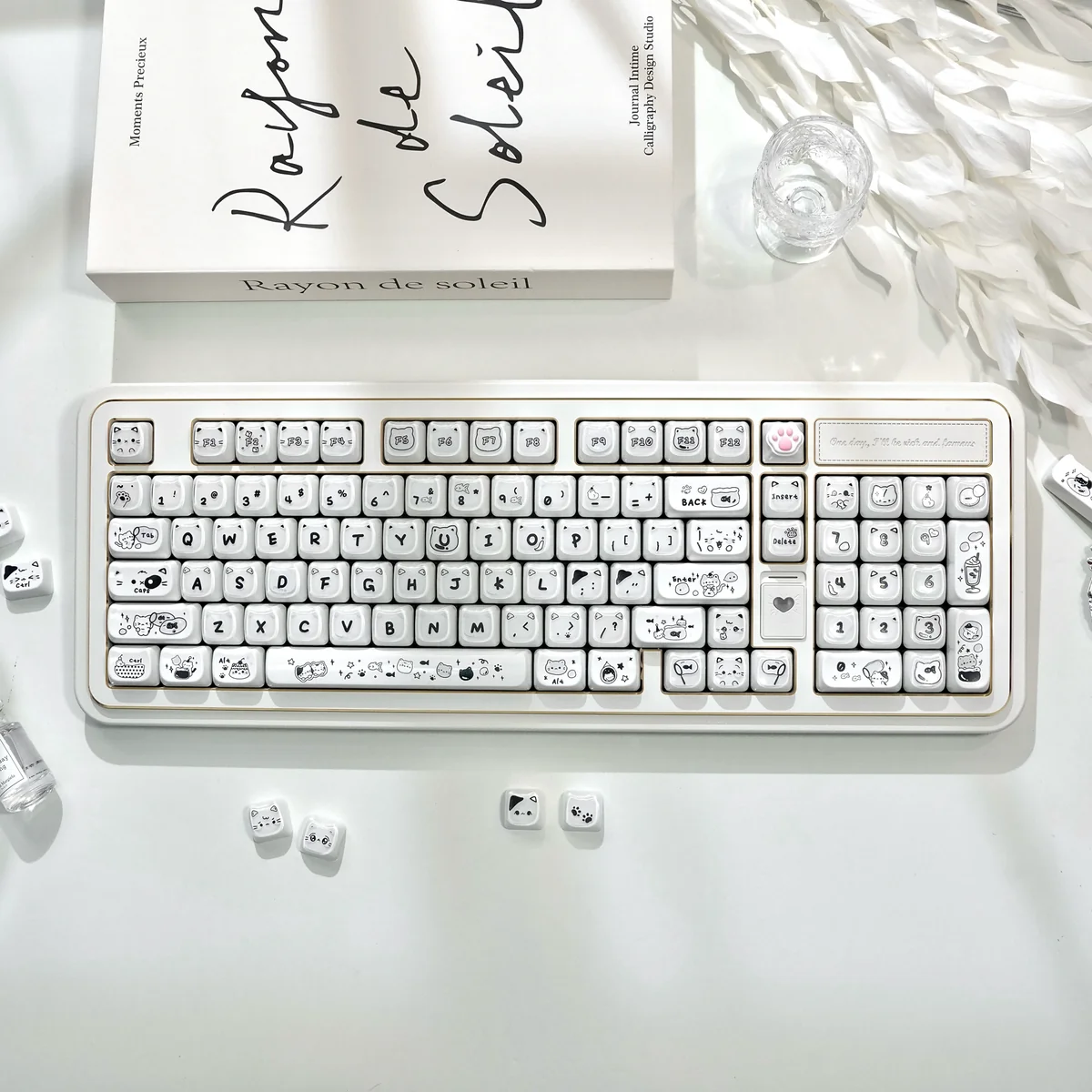 Translucent Crystal Jelly MAO keycaps set featuring playful pastel cat designs, displaying their sleek ergonomic profile and double-layered depth from various angles.