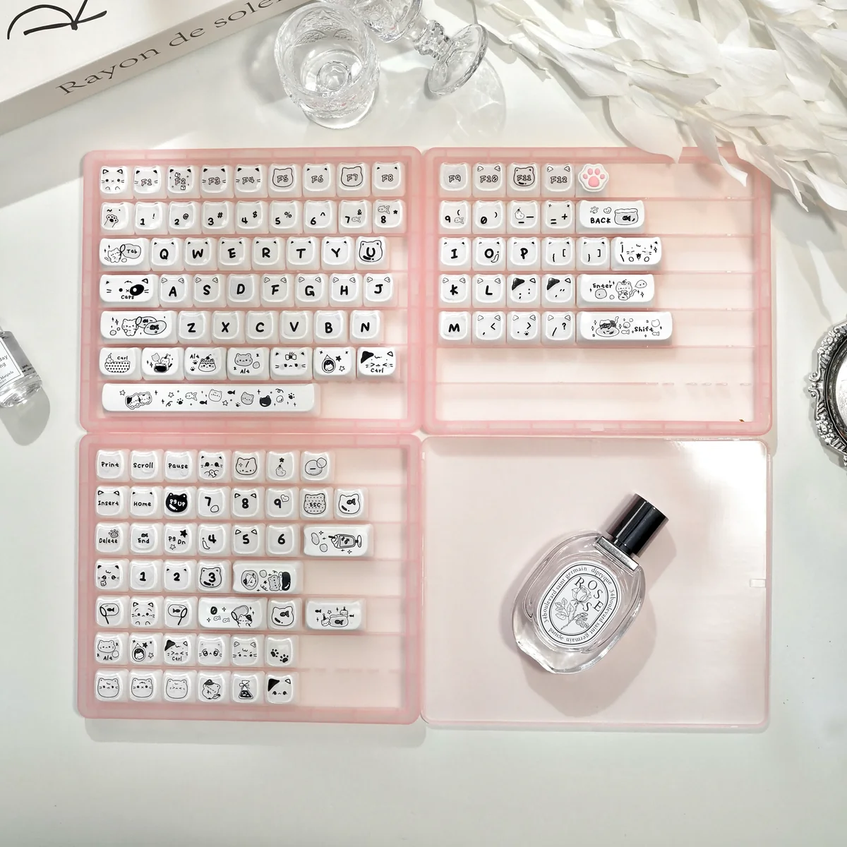 Playful white translucent Crystal Jelly MAO keycaps set featuring elegant cat line art, showcasing the sleek ergonomic profile and double-layered depth.