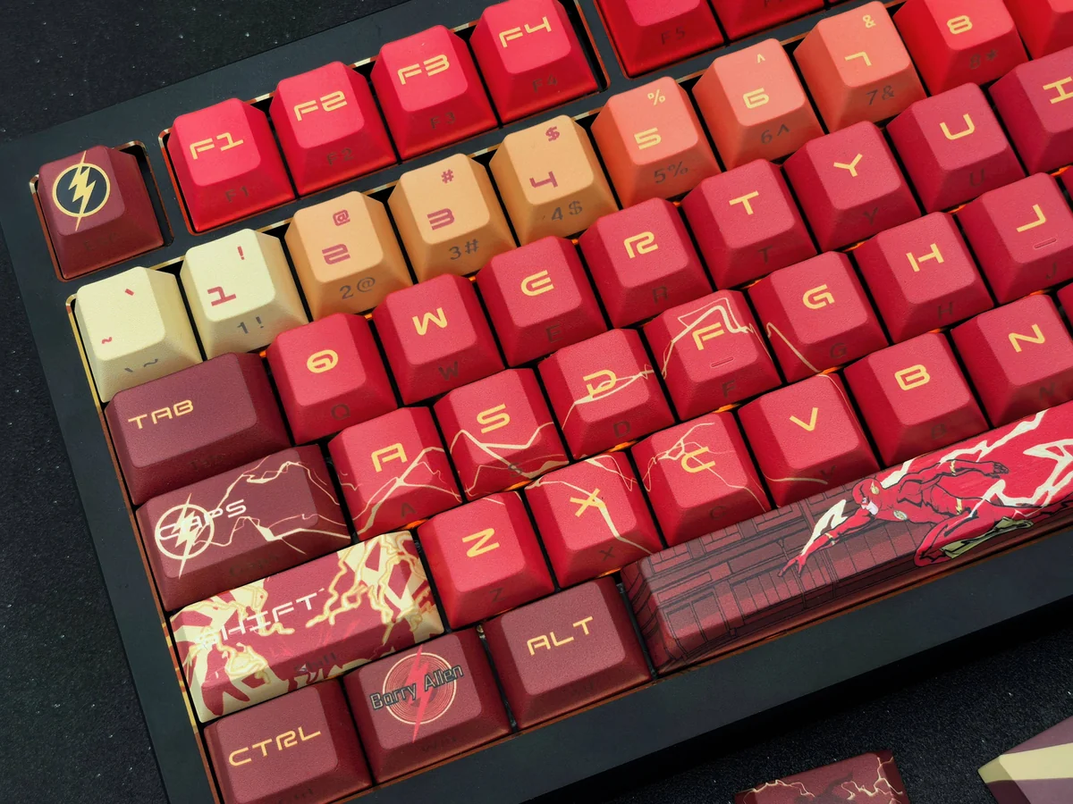 DC Flash artisan keycap set for mechanical keyboards. Iconic red insignia, lightning, and sleek side-engraved design, visible from multiple angles.
