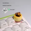 Gallery of whimsical handcrafted dessert artisan keycaps from various angles, highlighting vibrant 3D miniature details.