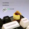 Close-up gallery of a whimsical handcrafted dessert artisan keycap, featuring intricate 3D details and vibrant colors from various angles.