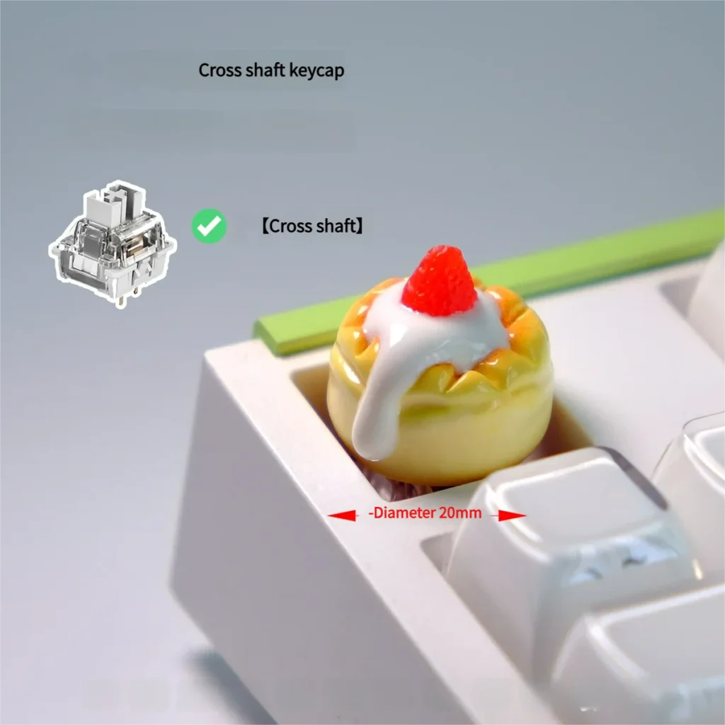 Handcrafted dessert artisan keycap featuring a charming 3D cake midst vibrant strawberry cream miniatures.