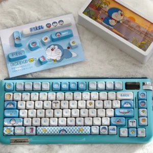 Iconic Doraemon PBT dye-sub keycaps set, vividly displaying beloved characters and gadgets for a playful, high-quality keyboard aesthetic.