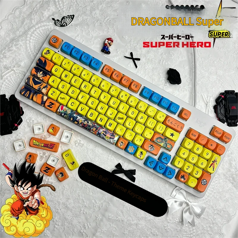 Epic Dragon Ball PBT dye-sub keycaps set captured from multiple angles, showcasing vibrant Super Saiyan characters and iconic symbols with playful, dynamic design.