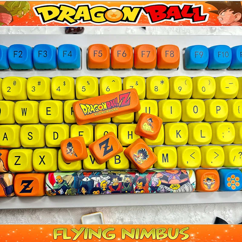 Vibrant Dragon Ball PBT dye-sub keycaps set, shown from multiple angles. Iconic Super Saiyan visuals bring playful, dynamic anime style.