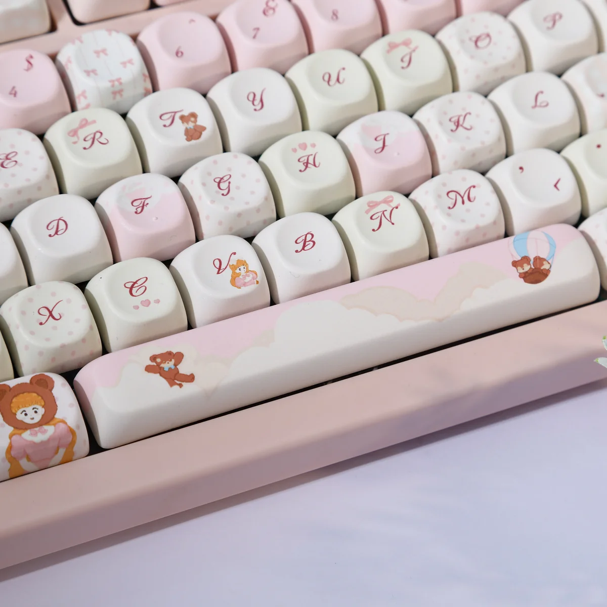 Whimsical Dream Island PBT dye-sub keycaps set, showcasing various angles of the set's ethereal islandscapes and soft, dreamy colors.