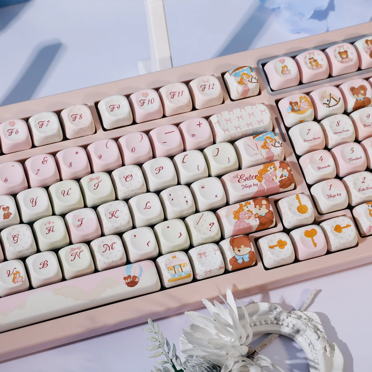Whimsical Dream Island PBT dye-sub keycaps set from a distinct angle, revealing ethereal islandscapes and soft, dreamy colors. Highlights the artistic fan.