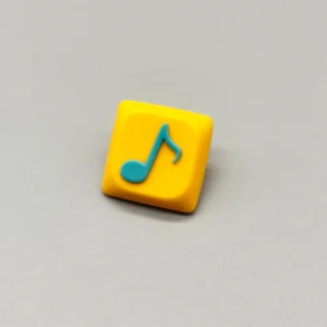 Handcrafted Eighth Note Symbol Keycaps featuring a vibrant yellow resin base and an embedded eighth note, perfect for musical keyboard enthusiasts.
