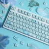 Endless Summer Keycaps Set close-up: durable PBT dye-sublimated set. Pastel blues, greens, whites evoke a serene, artistic, sun-drenched summer aesthetic.