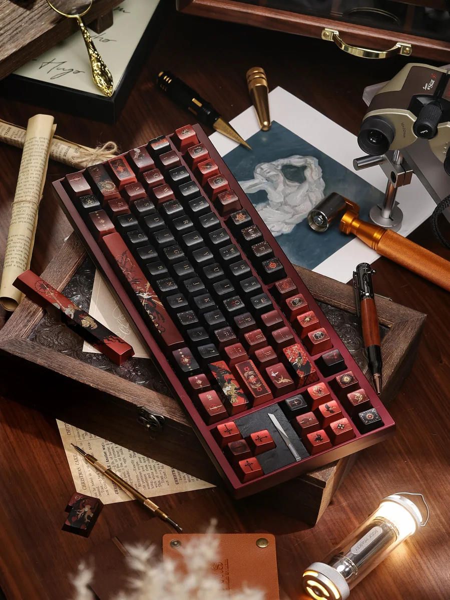 Detailed view of the handcrafted Fallen Starlight Lucifer artisan keycap set, emphasizing its dark celestial design, fallen angelic aesthetic, and metallic coating.