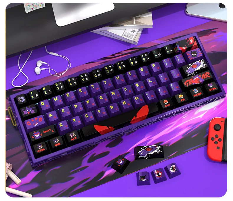 A small set of Gengar pearlescent metallic PBT keycaps set for magnetic switches, showcasing the mischievous ghost with a shimmering finish.